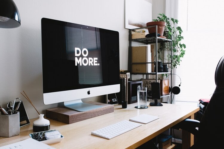 iMac with a Do More screensaver